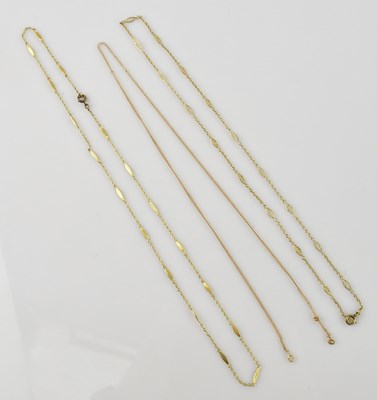 Lot 347 - Three yellow metal fine link necklaces, the...