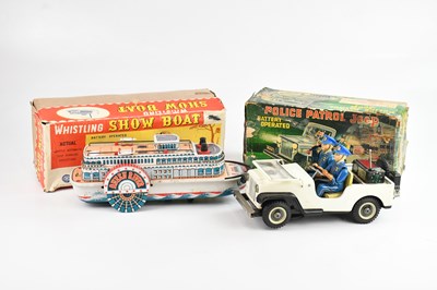 Lot 2127 - Two boxed model toys, comprising police patrol...
