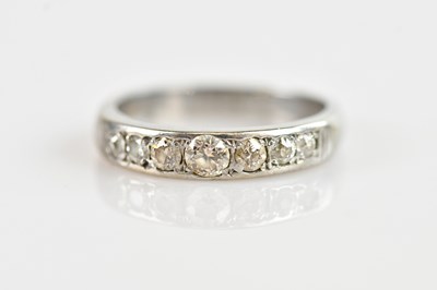 Lot 522 - A white metal diamond set seven stone half...