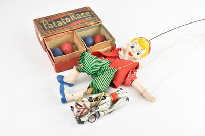 Lot 1656 - A vintage puppet, a further tinplate puppet of...
