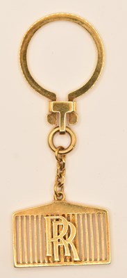 Lot 1297 - ROLLS-ROYCE; an 18ct yellow gold key chain,...