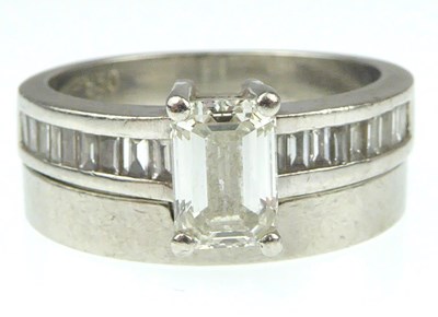 Lot 920 - A platinum and diamond engagement ring with...