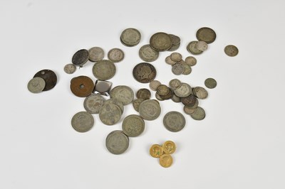 Lot 705 - A small collection of assorted coins including...