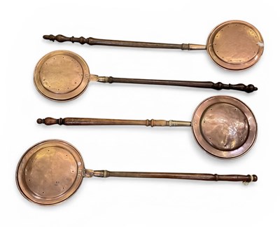 Lot 524 - Four 19th century copper bed warming pans, all...