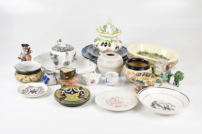 Lot 1284 - A group of decorative ceramics including...