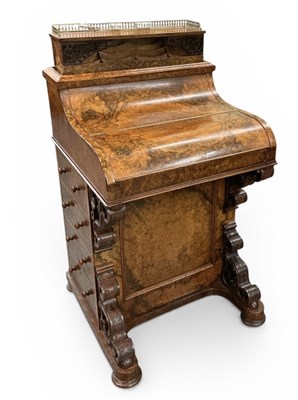Lot 12 - A Victorian burr walnut piano top Davenport...