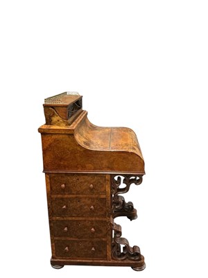 Lot 12 - A Victorian burr walnut piano top Davenport...