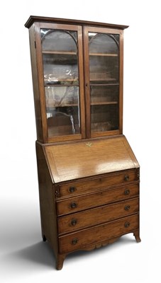 Lot 70 - A late 19th century mahogany bureau bookcase,...