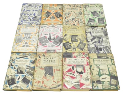 Lot 525 - ARTHUR RANSOME; twelve books from the...