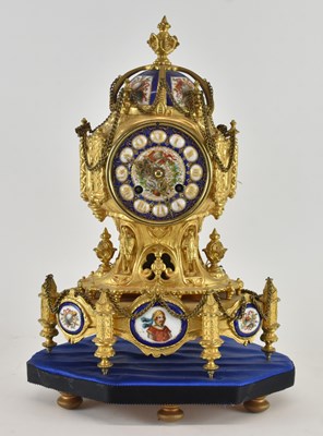 Lot 132 - A mid to late 19th century French gilt metal...