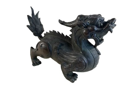 Lot 24 - A Chinese bronzed brass metal dragon, with...