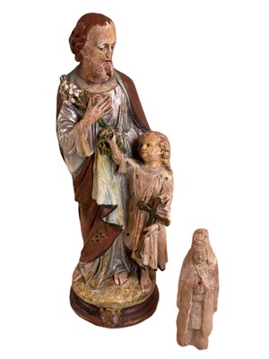 Lot 19 - A Chinese terracotta tomb attendant, height 18....