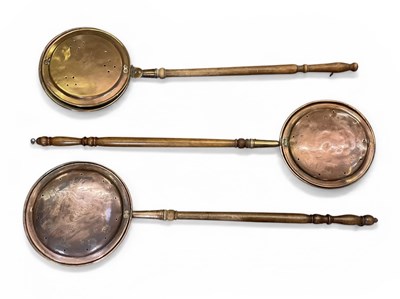Lot 592 - Three 19th century copper bed warming pans,...
