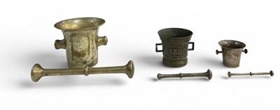 Lot 525 - Three graduated 19th century and later pestles...