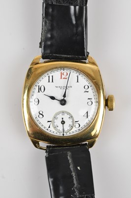 Lot 1186 - WALTHAM; a gentleman's 9ct gold trench type...