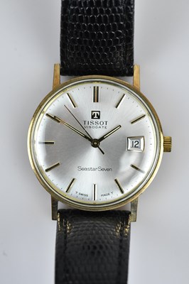Lot 1187 - TISSOT; a Visodate Seastar Seven 9ct gold...
