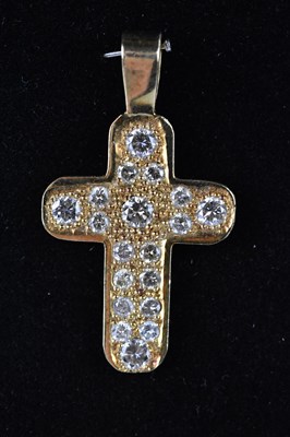 Lot 349 - An 18ct yellow gold crucifix diamond set...