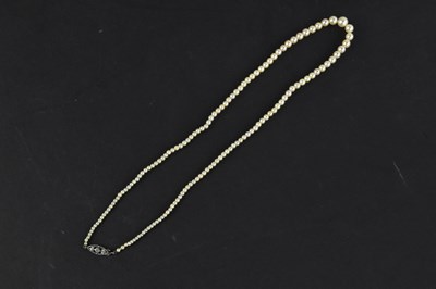 Lot 423 - A single strand cultured pearl necklace, with...