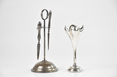 Lot 207 - A George V hallmarked silver manicure set, on...