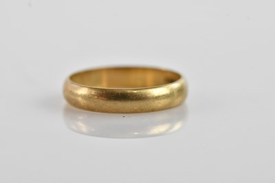 Lot 654 - A 9ct yellow gold wedding band, size N, approx...