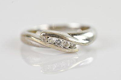 Lot 687 - A 9ct white gold dress ring set with five...