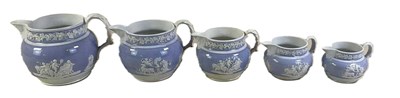 Lot 270 - A set of five Victorian graduated jugs, lilac...