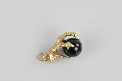 Lot 22 - A 9ct yellow gold St Christopher pendant and a...