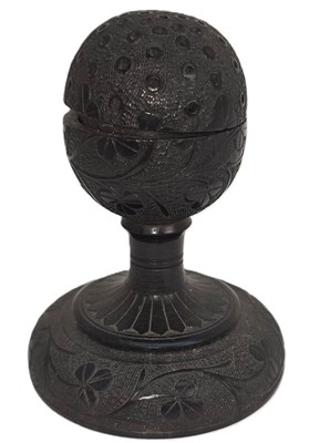 Lot 387 - A Victorian Irish black bog oak hatpin holder,...