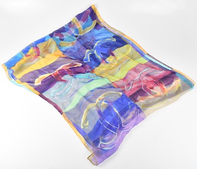 Lot 1185 - CHANEL; a 100% silk multicoloured scarf with...