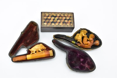 Lot 258 - Two cased Meerschaum pipes, one depicting wild...