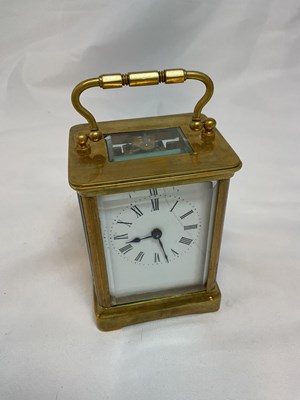 Lot 630 - A circa 1900 French brass carriage clock, with...