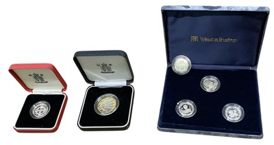 Lot 1627 - Six silver coins including a Royal Mint 2000...