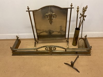 Lot 652 - A brass and metal fireside set, to include a...