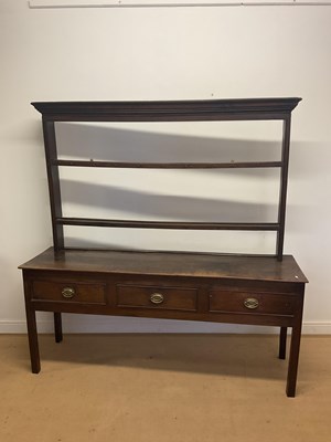 Lot 793 - An oak Georgian style Welsh dresser with three...
