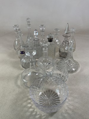 Lot 320 - A collection of thirteen decanters, mostly cut...