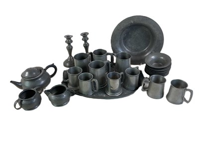 Lot 653 - A quantity of pewter, including mugs,...