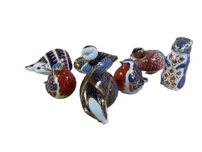Lot 246 - ROYAL CROWN DERBY; seven animal and bird...