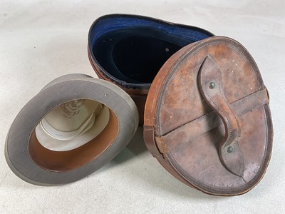 Lot 365 - MOSS BROS; an early 20th century top hat,...