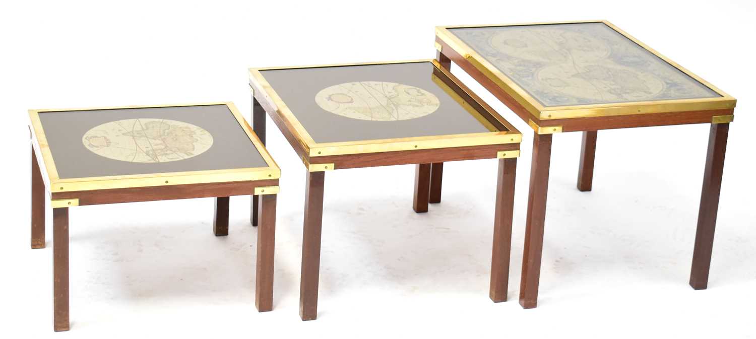 Lot 31 - A nest of mid-20th century tables, the tops...