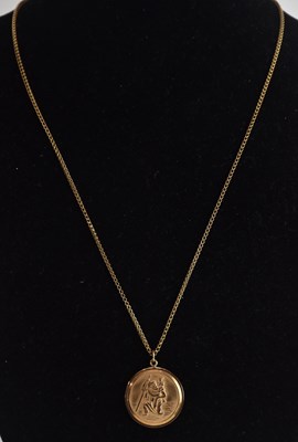 Lot 1443 - A 9ct yellow gold St Christopher pendant,...