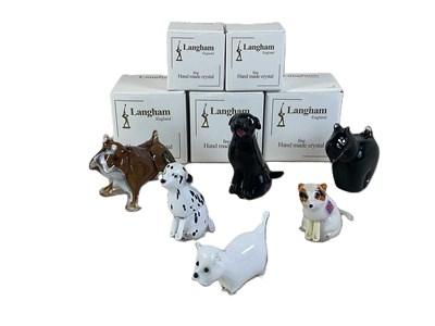 Lot 325 - LANGHAM; six glass dogs, various sizes and...