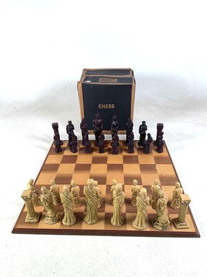 Lot 64 - ANNE CARLTON; a chess board with figural resin...