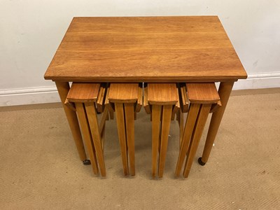Lot 679 - A Danish mid century set of tables in the...