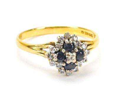 Lot 565 - An 18ct yellow gold diamond and sapphire...