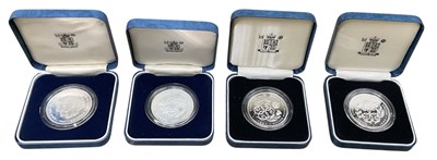 Lot 1609 - THE ROYAL MINT; four silver collectors' coins...