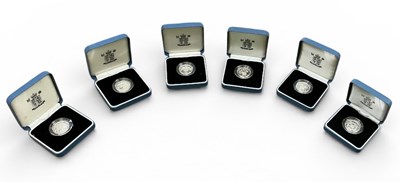 Lot 1615 - THE ROYAL MINT; six United Kingdom silver...