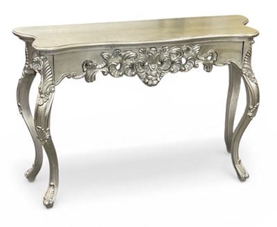 Lot 65 - A modern French style silvered carved wooden...