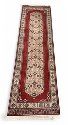 Lot 101 - A hand woven Pakistani Jalder runner, 330 x 90cm.