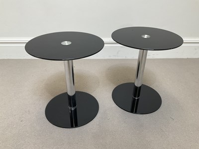 Lot 1031 - A pair of modern glass and chrome circular...