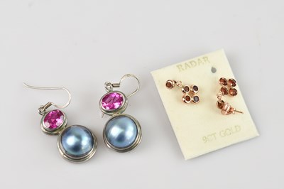 Lot 274 - A pair of 9ct rose gold ear studs and a pair...